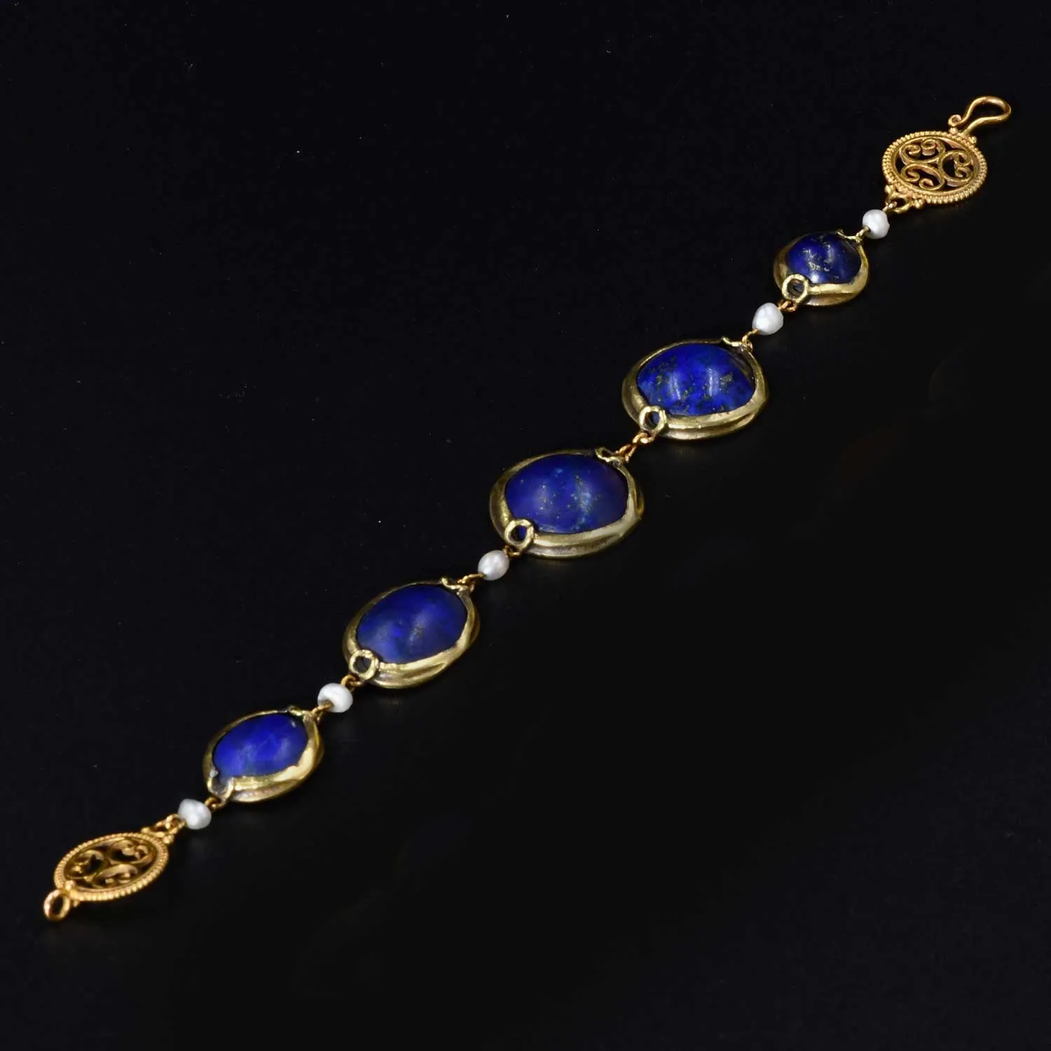 A Victorian Bracelet set with five ancient Egyptian Lapis Lazuli Scaraboids, 18th Dynasty, ca 1550 - 1295 BCE