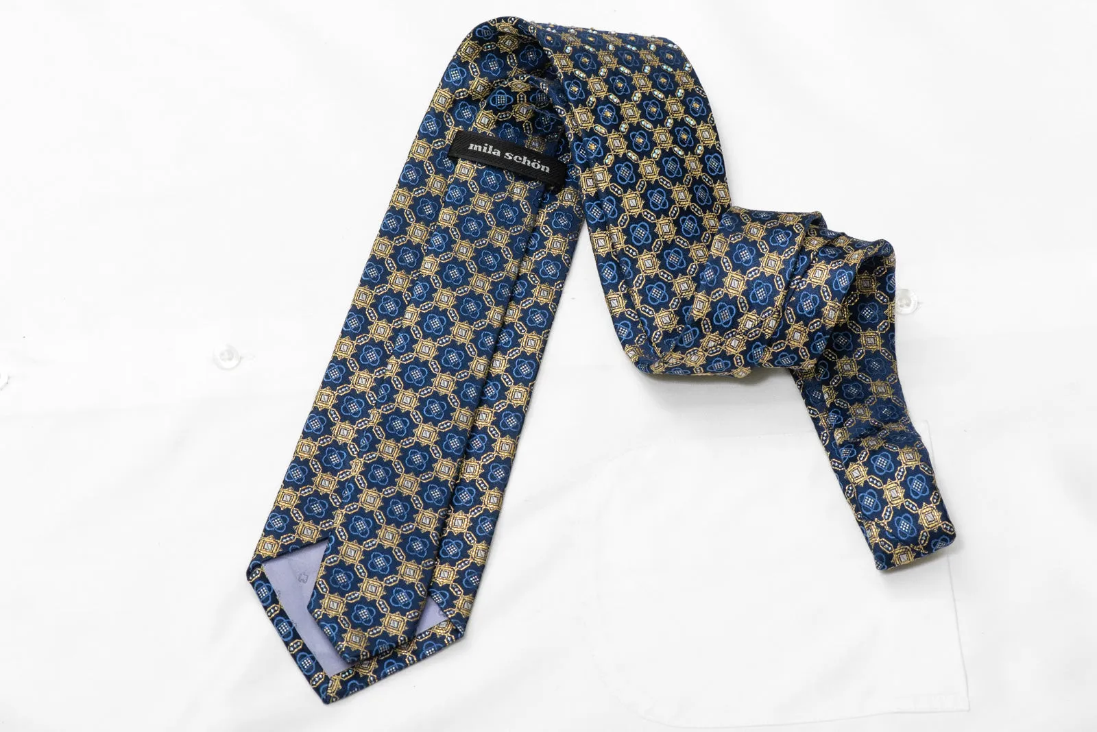 Gold Interlocking Geometric Design On Dark Blue Rhinestone Tie With Gold Sparkles