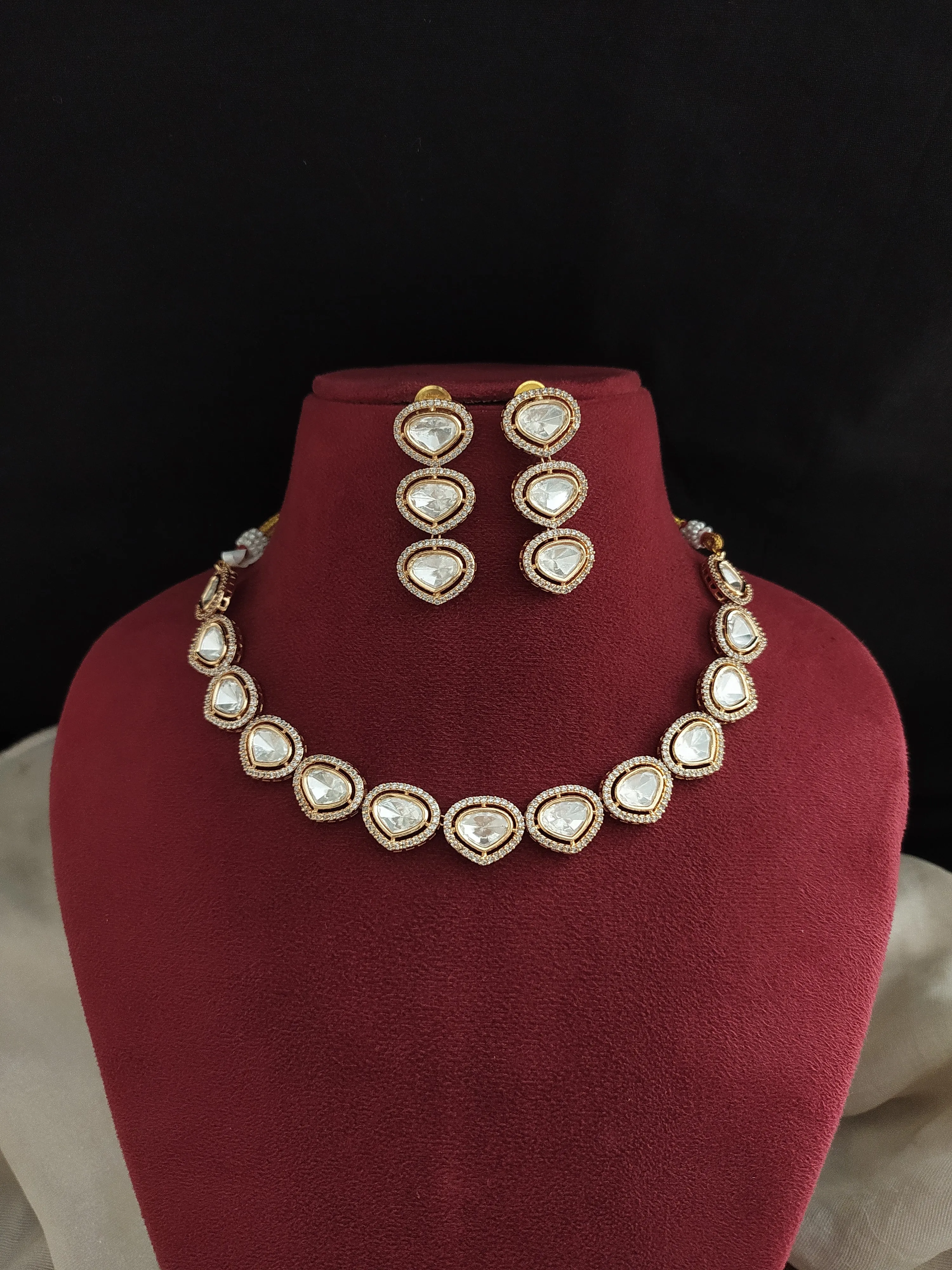 Sleek Kundan Necklace Set – Tear-Drop Shaped Kundan Stones with Matching Dangling Earrings